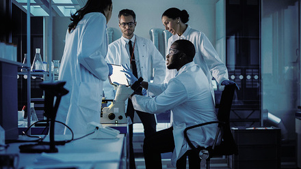Group of doctors talking in a laboratory