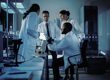 Group of doctors talking in a laboratory