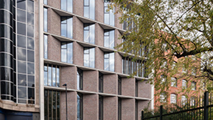 Exterior view of the back of 6 Alie Street from a distance