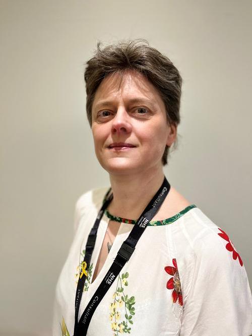 Dr Karen Mitchell smiling at the camera