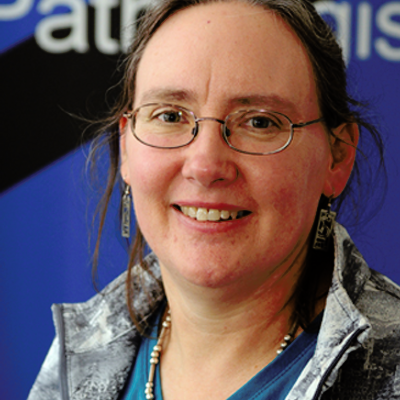Dr Kimberly Gilmour smiling at the camera