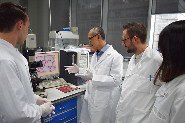 Professor Cheng Hock-Toh in the lab with colleagues
