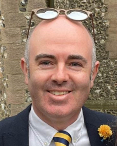 Dr Donall Forde smiling at the camera