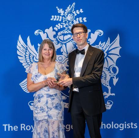 Winners of the 2025 RCPath Achievement Awards in front of the RCPath banner