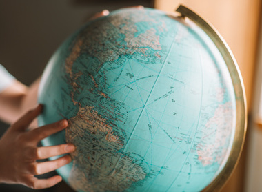 Person holding a globe.jpg