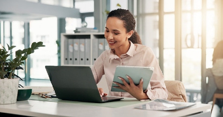Person writing a  digital report for internal audit
