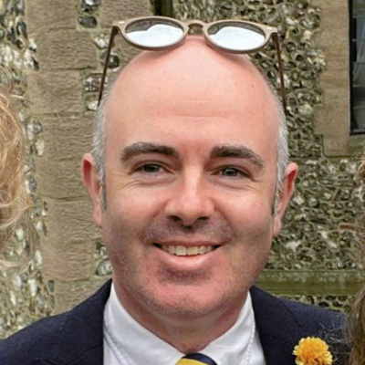 Dr Donall Forde smiling at the camera