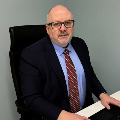 Dr Bernie Croal