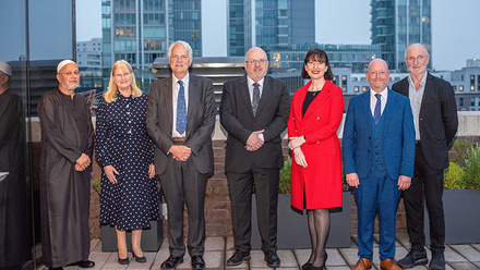 Attendees of a medical examiner event on the roof terrace