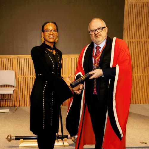 Dr Vanessa Djabety receives her award from Dr Bernie Croal at the New Fellows Ceremony