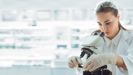 medical_scientist_researcher_using_microscope_laboratory.jpg