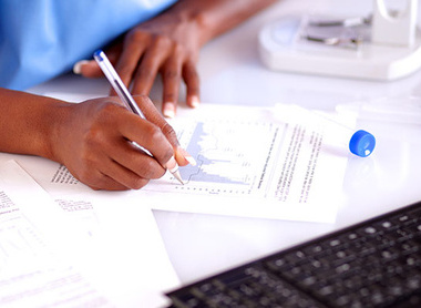 A person evaluating a data report