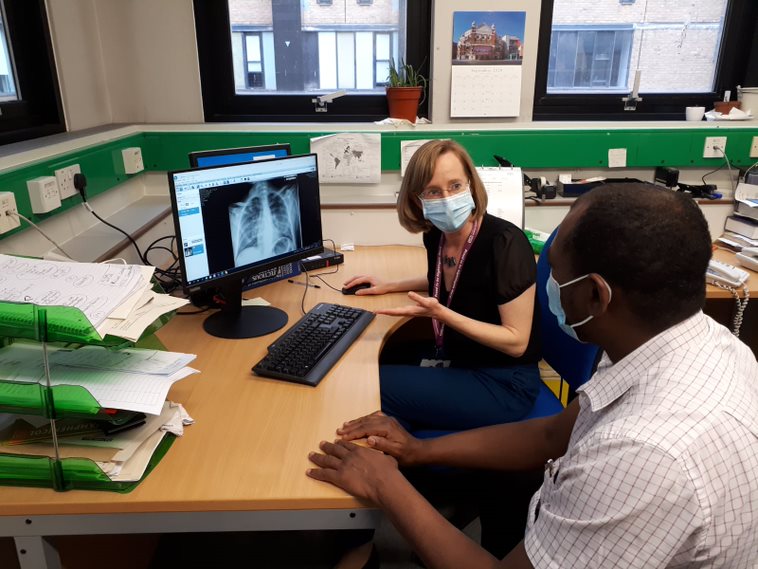 Dr Ahmed and Dr Louise Berry reviewing a chest X-ray.