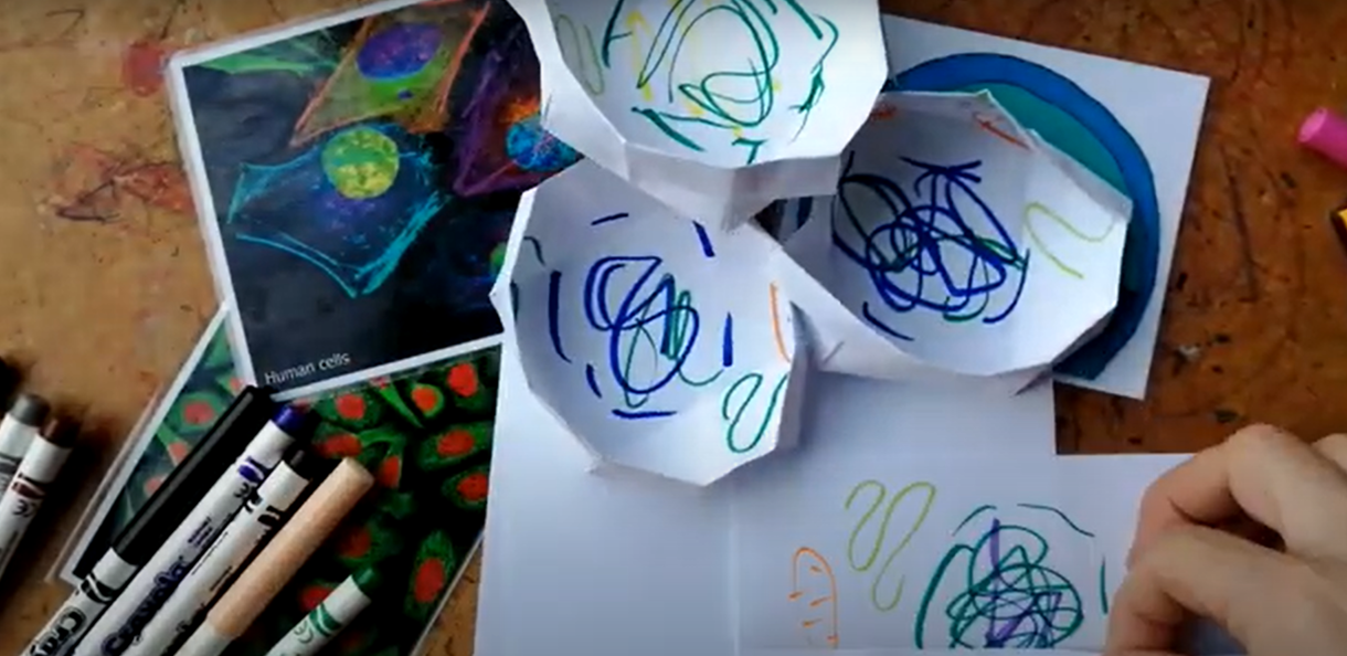 Still from a timelapse video of origami cancer cells being made