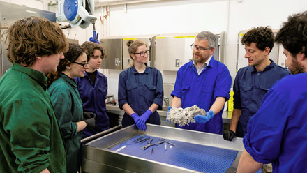 Veterinary trainees examining a skull