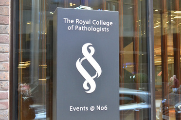 College building exterior with logo
